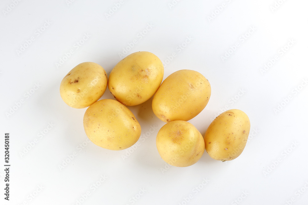 Yellow color small baby potato on white background Yellow color small baby potato on white background
