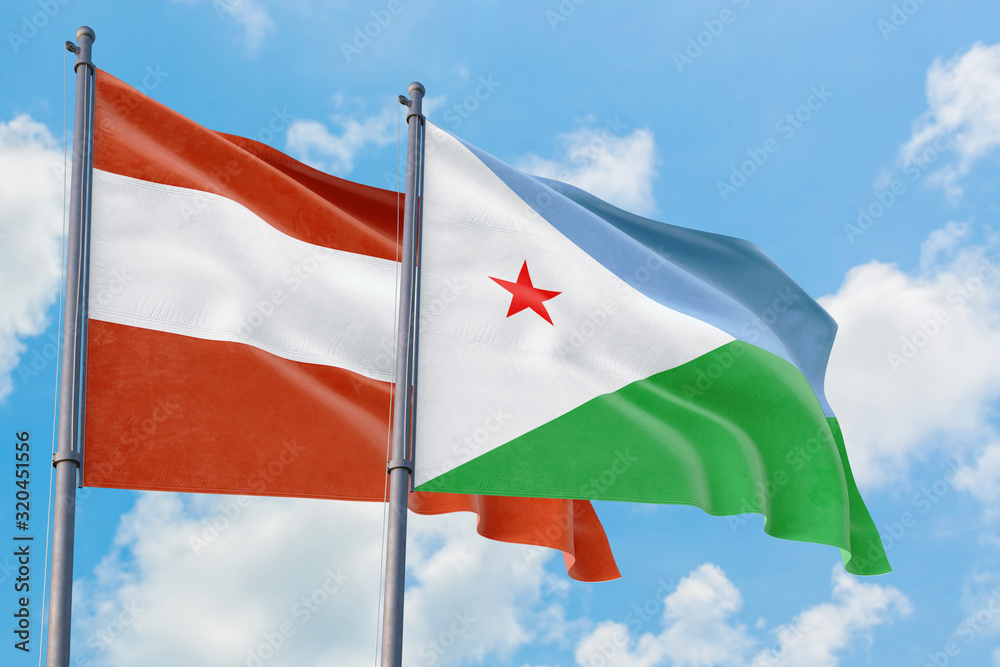 Djibouti and Austria flags waving in the wind against white cloudy blue sky together. Diplomacy concept, international relations. Djibouti and Austria flags waving in the wind against white cloudy blue sky together. Diplomacy concept, international relations.