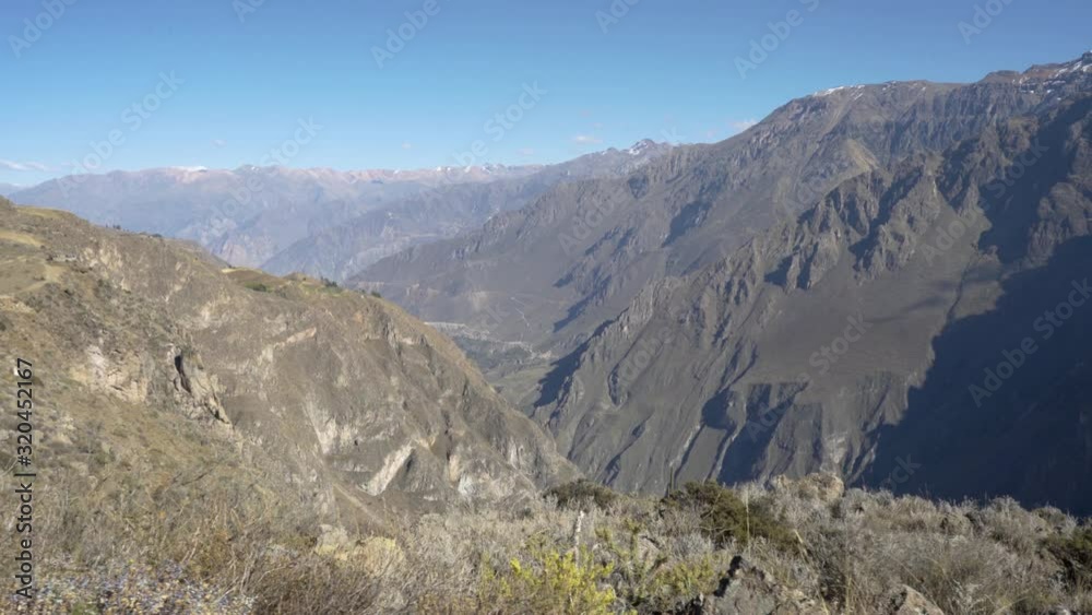 View of the beautiful scenic landscape in the Colca Canyon with its deep valley. Famous tourist attraction and travel destination near Arequipa in the Andes Mountains of Peru. Close to Cruz del Condor View of the beautiful scenic landscape in the Colca Canyon with its deep valley. Famous tourist attraction and travel destination near Arequipa in the Andes Mountains of Peru. Close to Cruz del Condor