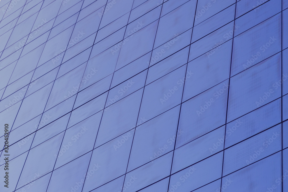 Blue glass windows of modern office building Blue glass windows of modern office building
