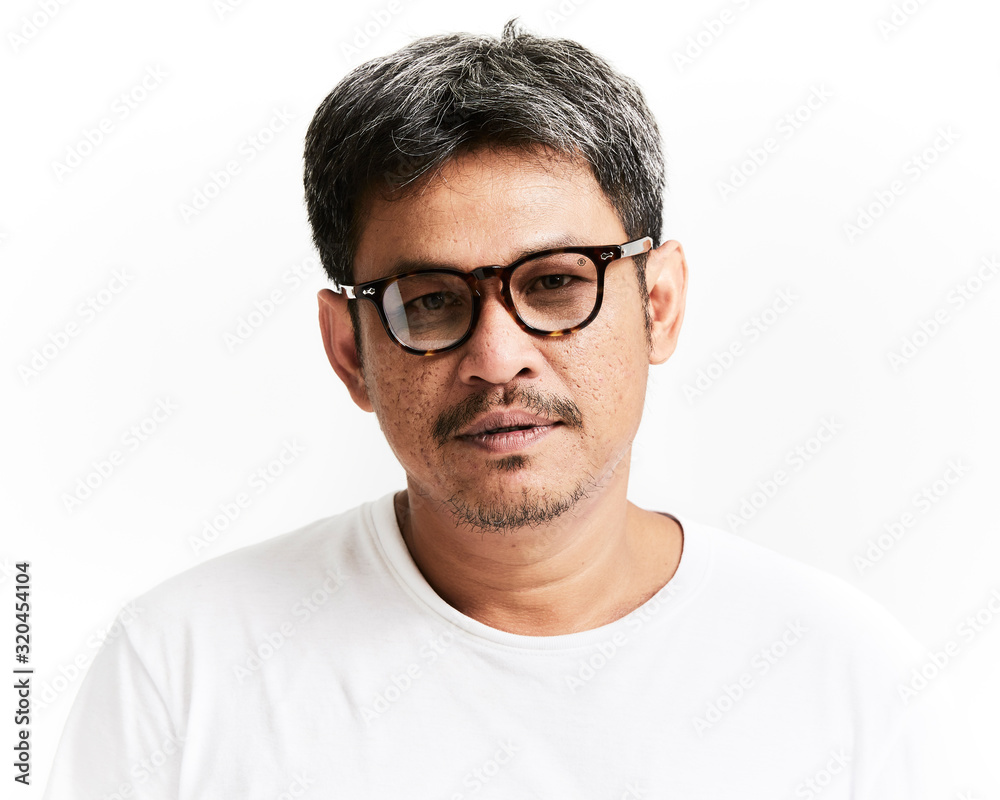 Portrait of smiling young man wearing t-shirt