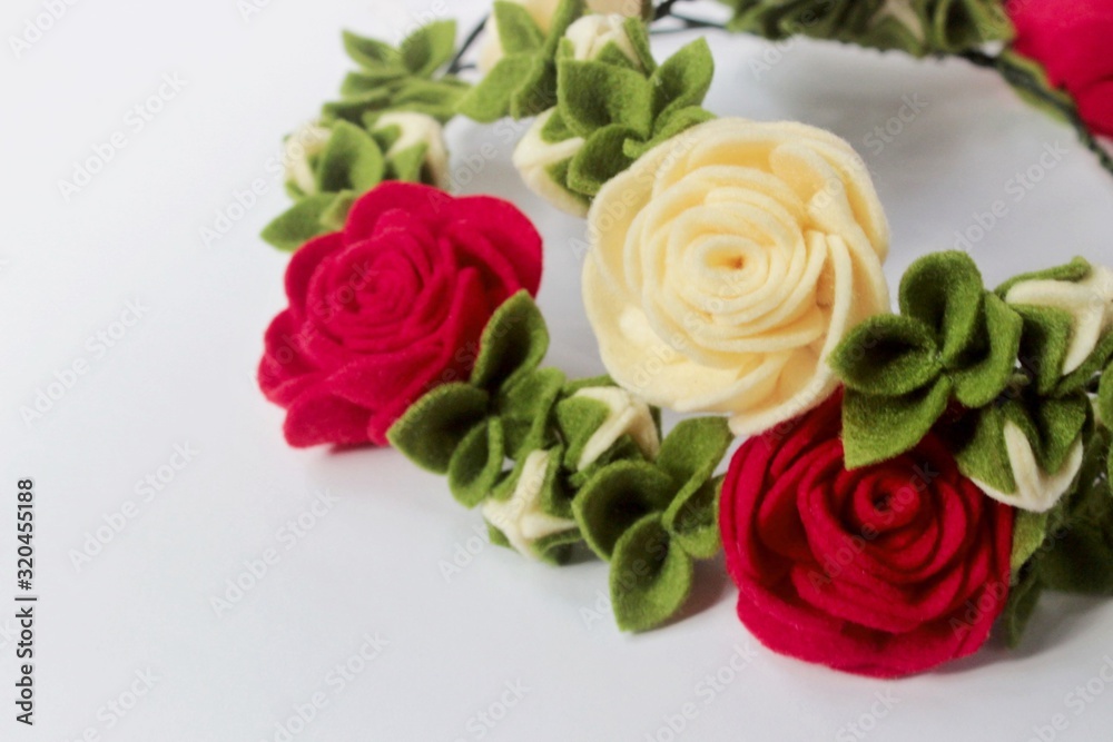 Beautiful Handmade Felt Floral Crown or tiara with Rose flowers and Green leaves for wedding event or feminine decorative element Beautiful Handmade Felt Floral Crown or tiara with Rose flowers and Green leaves for wedding event or feminine decorative element