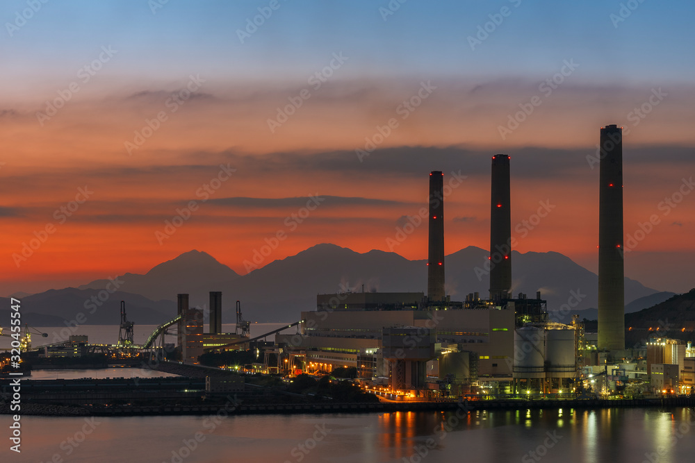 Power plant in Hong Kong city at dusk
