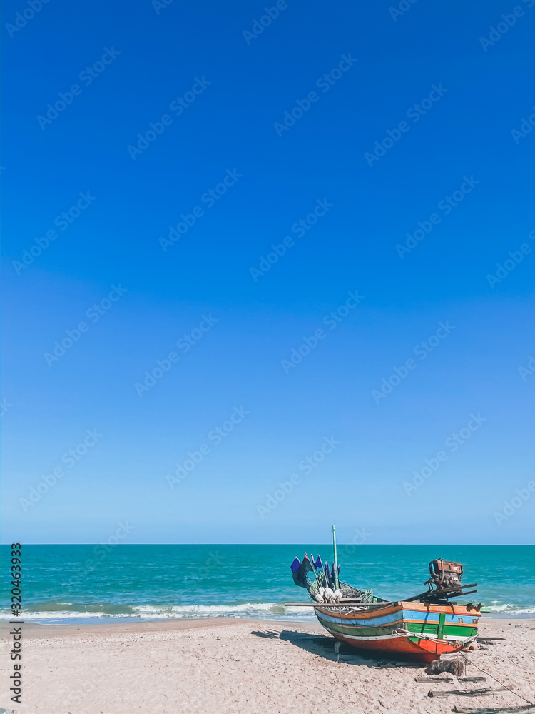 Beautiful view fishing boat on the beach tropical island seascape backgrounds