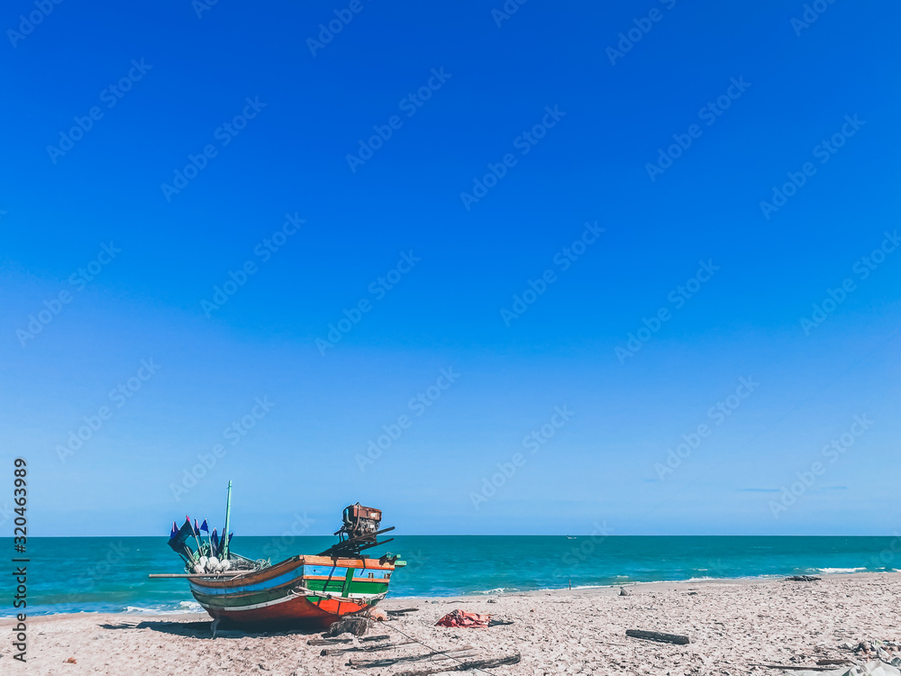 Fototapeta premium Boat on the beach nature wallpaper seascape backgrounds