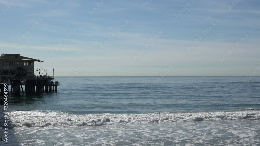 The end of the Santa Monica Pier and the beautiful Pacific Ocean The end of the Santa Monica Pier and the beautiful Pacific Ocean