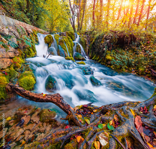 Fototapeta Naklejka Na Ścianę i Meble -  Marvelous morning view of pure water waterfall in Plitvice National Park. Attractive autumn scene of Croatia, Europe. Beauty of nature concept background.