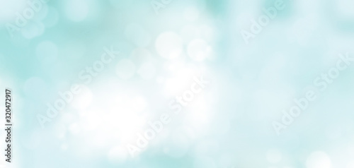 Abstract illustration of blurred light spots on blue background