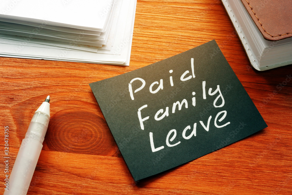 Text sign showing hand written words Paid family leave Text sign showing hand written words Paid family leave