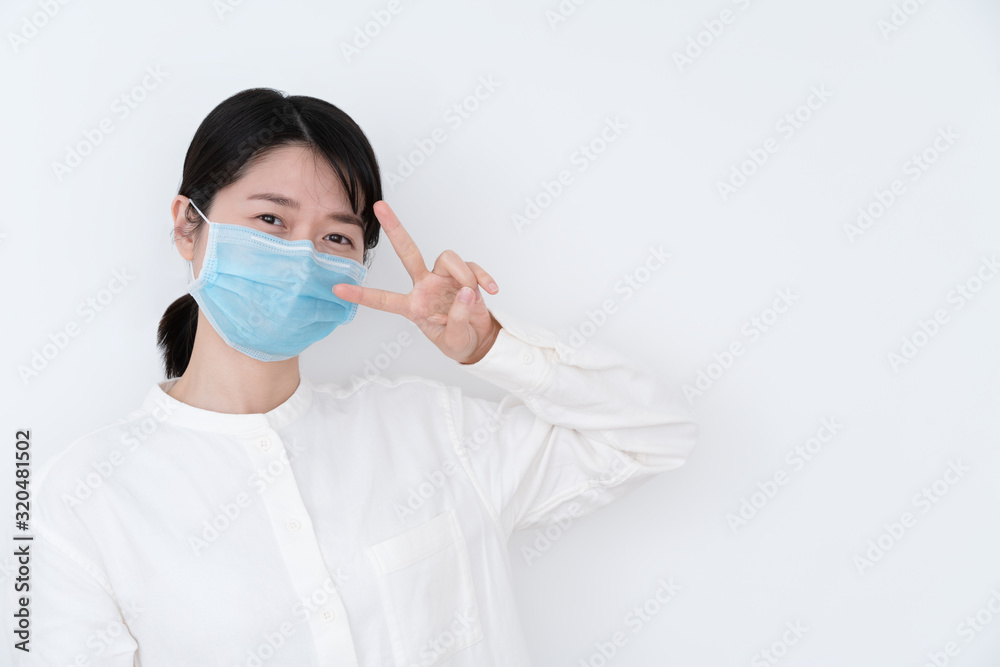 Asian woman wearing a protective mask Asian woman wearing a protective mask