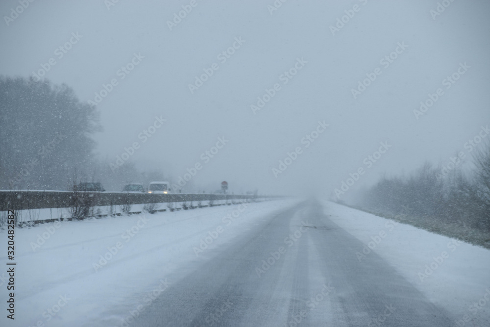 Fototapeta premium Snow covered on the road in winter