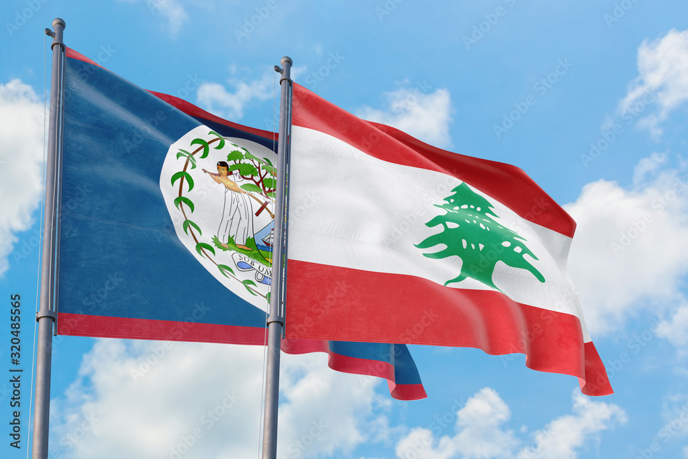 Lebanon and Belize flags waving in the wind against white cloudy blue sky together. Diplomacy concept, international relations. Lebanon and Belize flags waving in the wind against white cloudy blue sky together. Diplomacy concept, international relations.