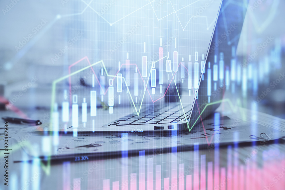 Stock market graph and table with computer background. Double exposure. Concept of financial analysis. Stock market graph and table with computer background. Double exposure. Concept of financial analysis.
