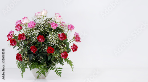 Bouquet of roses isolated on light gray background
