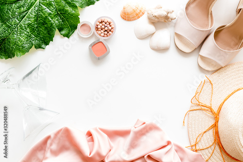 Shopping concept. Women clothes  cosmetics  shoes on white background top-down frame copy space
