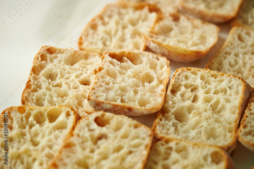 Wallpaper Mural Slicing bread half on cutting board  Torontodigital.ca