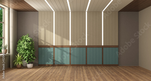 Fotografia Empty room with wooden paneling with led light