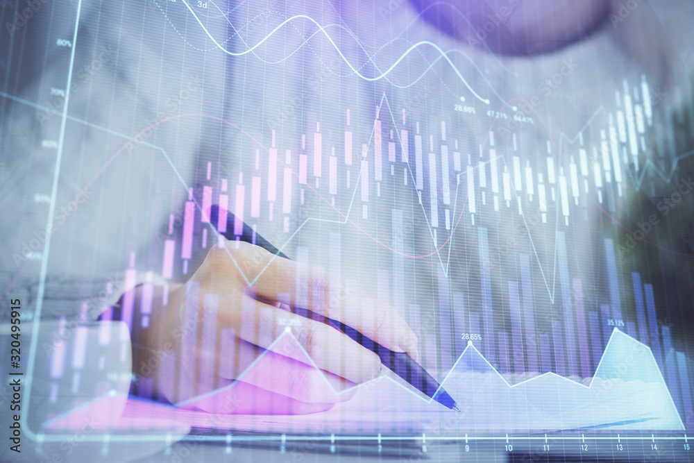 Forex chart displayed on woman's hand taking notes background. Concept of research. Multi exposure Forex chart displayed on woman's hand taking notes background. Concept of research. Multi exposure
