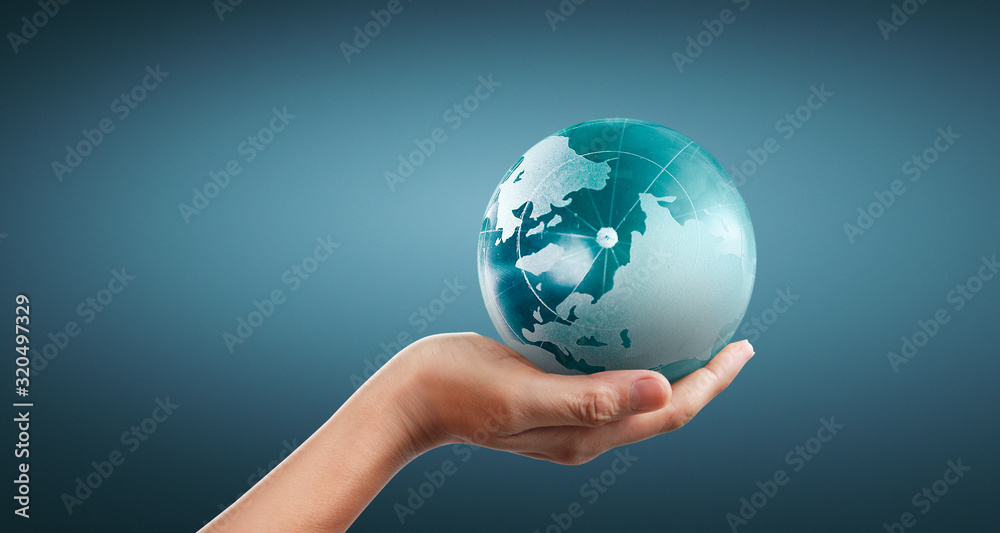 Globe ,earth in human hand, holding our planet glowing Globe ,earth in human hand, holding our planet glowing