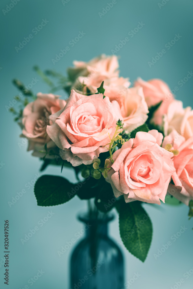Close up of  pink rose bouquet in a vase - obrazy, fototapety, plakaty 