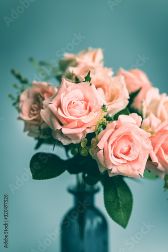 Fototapeta Naklejka Na Ścianę i Meble -  Close up of  pink rose bouquet in a vase