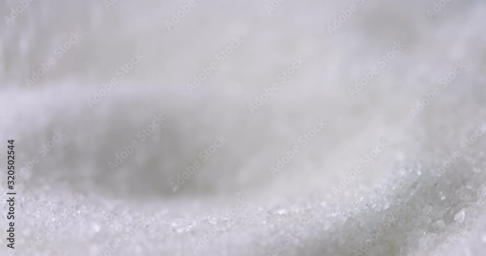 Sugar or Salt taken with Spoon from a bowl at closeup. Slow motion, 4k resolution Sugar or Salt taken with Spoon from a bowl at closeup. Slow motion, 4k resolution
