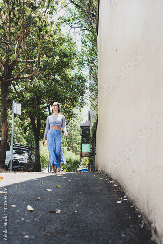 woman walking on footpath in Sydney