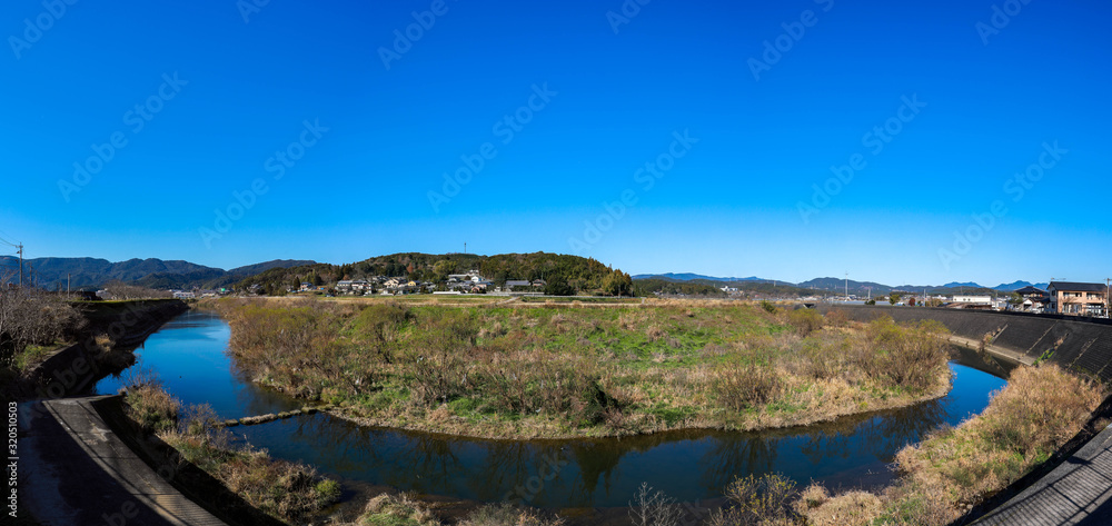 panoramic view of canal beside the road at Japan