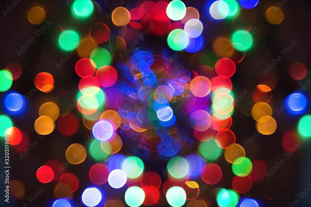 Christmas season bokeh background with round colorful lights