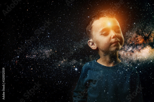 a small child whose light shines in his forehead. He imagines himself an astronaut