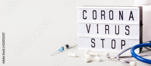 Lightboard with words Coronavirus stop. Web banner with Coronavirus treatment concept