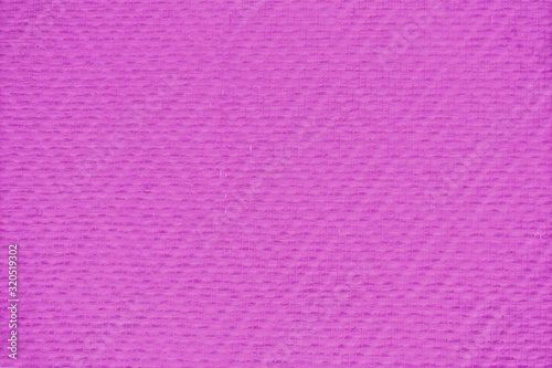 Purple paint background on the wall with rhombus pattern, texture