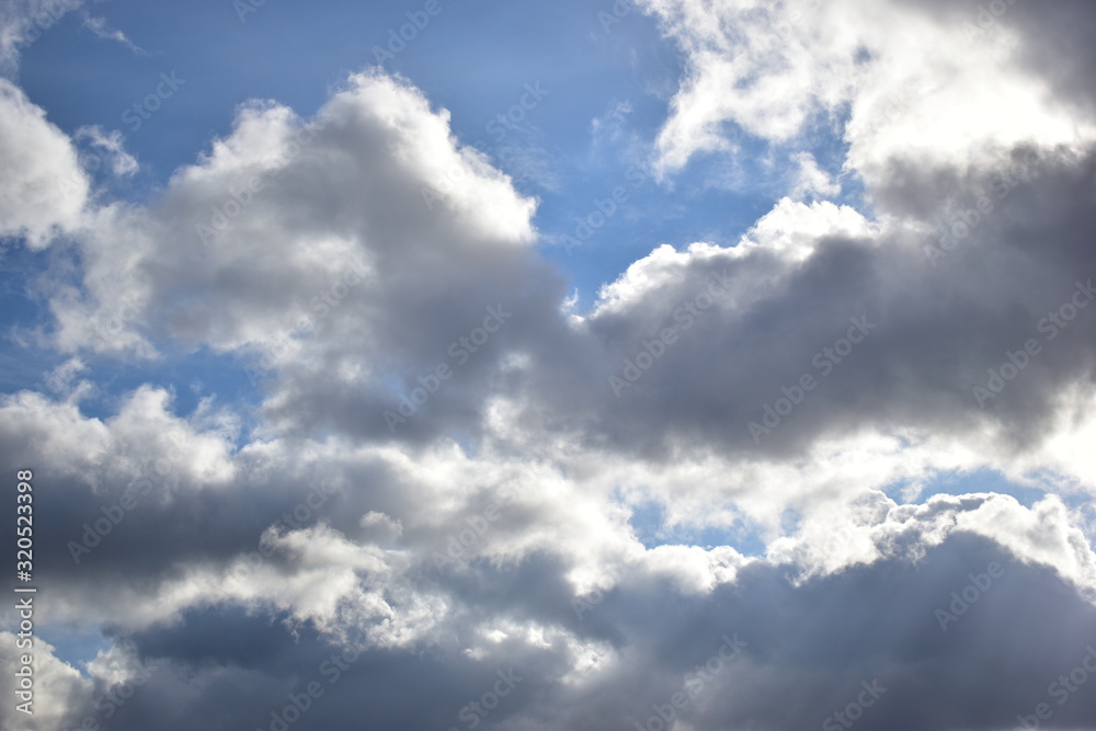 clouds against a blue sky