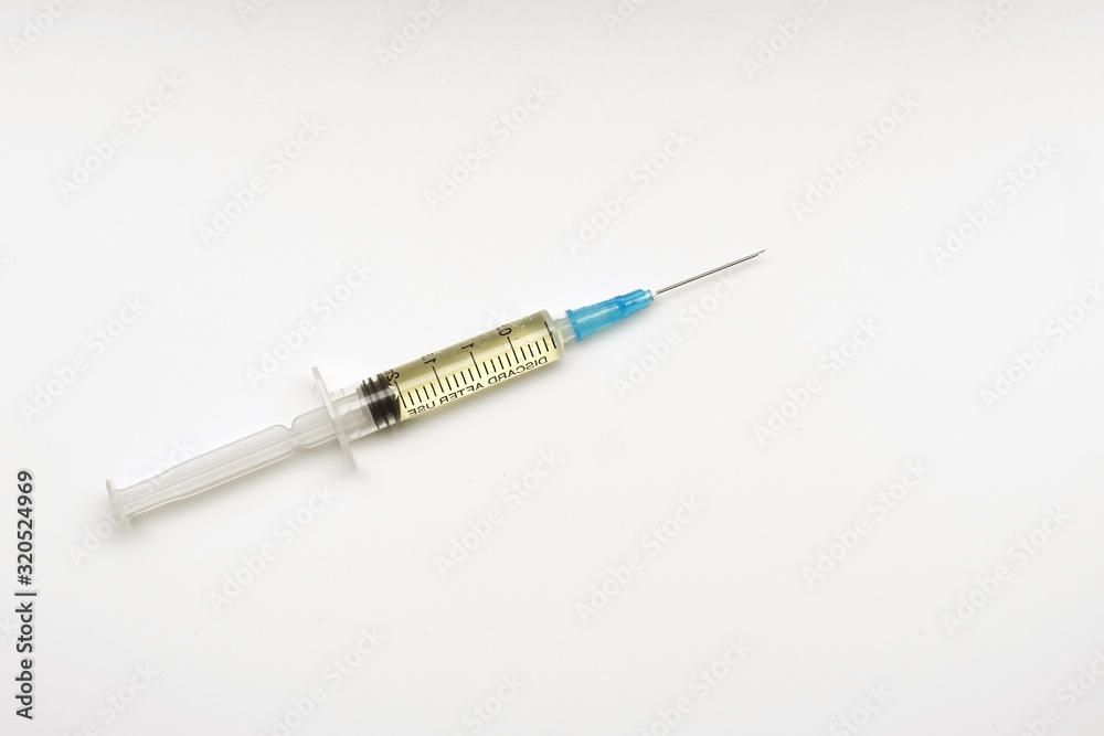 vaccination syringe with a needle on a white background. the concept of medicine. vaccination syringe with a needle on a white background. the concept of medicine.
