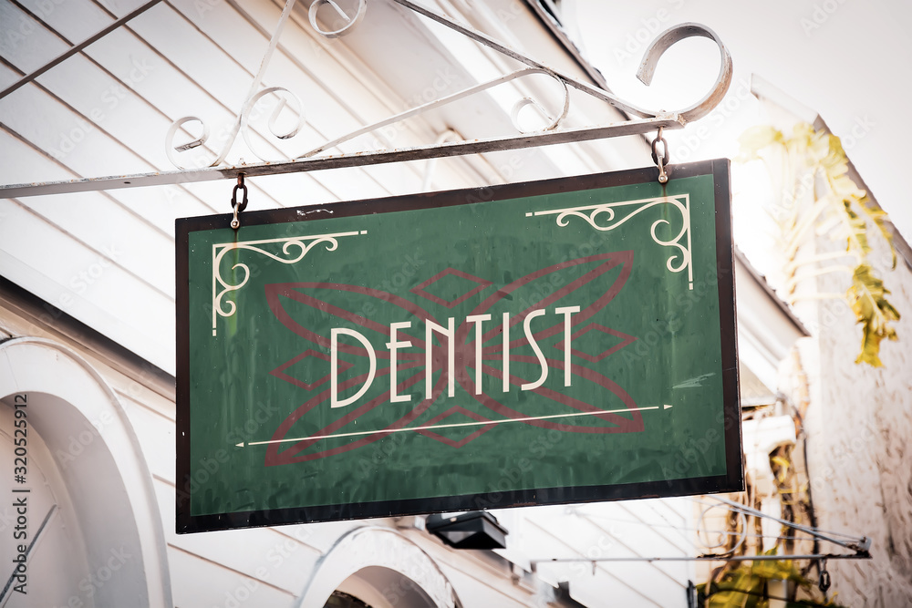 Obraz premium Street Sign to Dentist