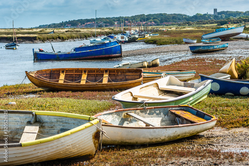 Bild auf Leinwand Boats at Morston Quay on north Norfolk coast, East Anglia, England, UK