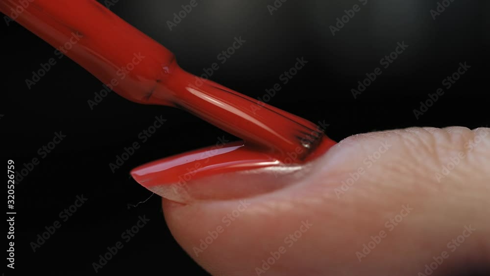 Manicure nail paint. Master applies gel polish on nails in manicure salon. Nail polish. Manicure nail paint. Master applies gel polish on nails in manicure salon. Nail polish.