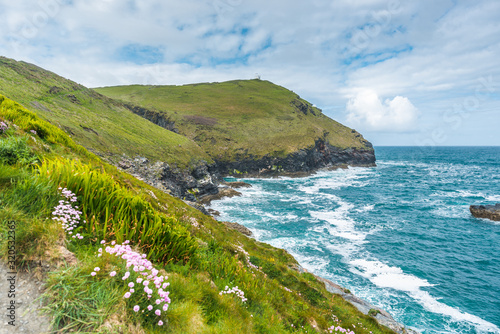 South West Coast Path from Boscastle towards Willapark Lookout in the distance, North Cornwall, England, UK.