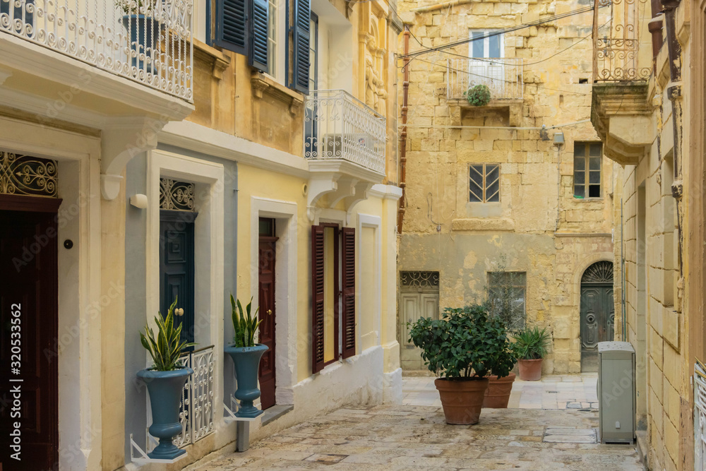 View of ancient street in historical center of Birgu or Vittoriosa city in Malta