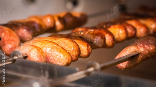 sausages on the grill