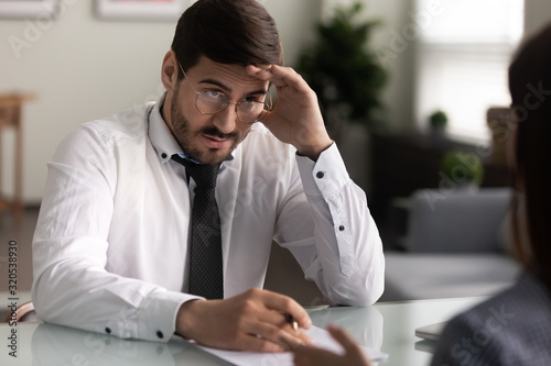 Employer looking at applicant with disbelief failed job interview concept