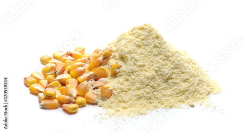 Bilde på lerret Corn flour with kernels pile isolated on white background