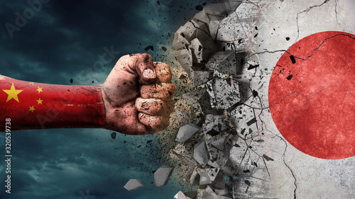 Photography Fist breaking rock. China destroying Japan