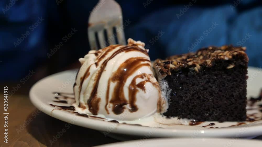 Close of Brownie cake and ice cream on table Close of Brownie cake and ice cream on table