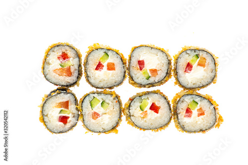 sushi and rolls with different toppings in eight pieces close-up on a white background top view