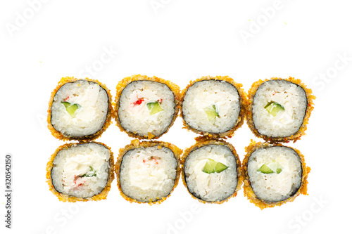 sushi and rolls with different toppings in eight pieces close-up on a white background top view