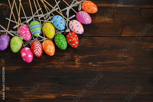 Easter eggs on dark wooden background