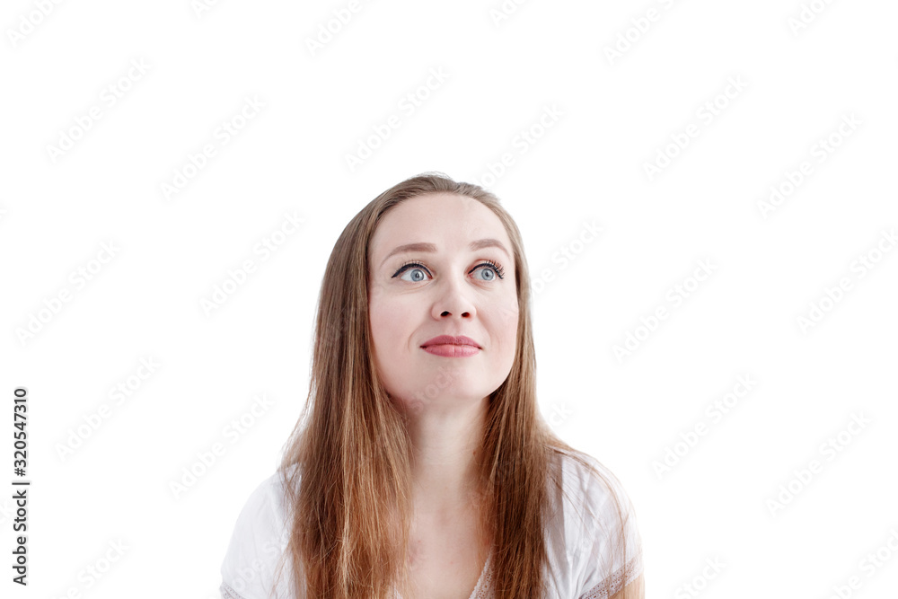 Close-up headshot of young natural pensive woman with long hair and natural make-up, female smiling and looking away Close-up headshot of young natural pensive woman with long hair and natural make-up, female smiling and looking away