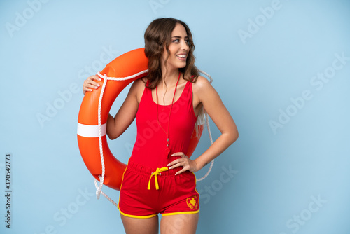 Lifeguard woman over isolated background