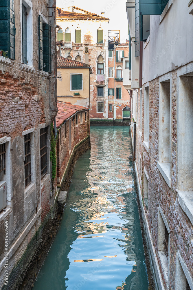 Art and reflections along the calli of Venice. Italy